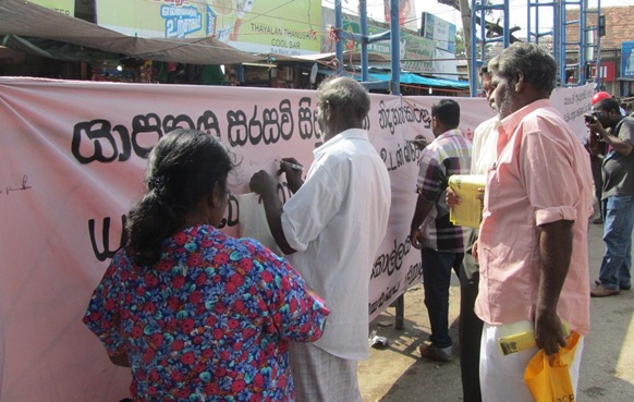 The FLSP banner for signature campaign in Jaffna city on Tuesday