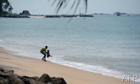 ALeqM5ioKx-The beach at Peraliya village in southern Sri Lanka on December 26, 2012 (AFP, Lakruwan Wanniarachchi)