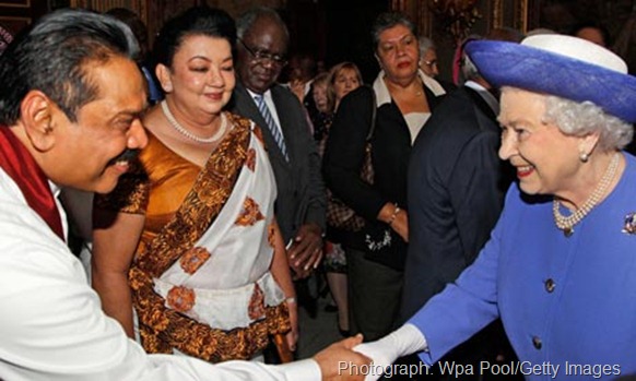 The Queen shakes hands with Sri Lankan president Mahinda Rajapaksa at the Commonwealth heads of government meeting last year. Photograph: Wpa Pool/Getty Images