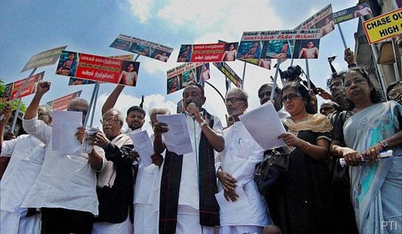 PTI MDMK Chief Vaiko with members of various political parties during a protest against Sri Lankan President Mahinda Rajapaksa at Madras High Court premises in Chennai on Monday. 