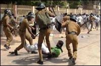 After the war: SL Police in Jaffna deployed in attacking Tamil student's peaceful protest in November 2012 [Library Photo]