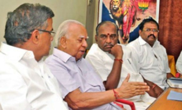 TNA leader R. Sambanthan interacts with BJP leaders L. Ganesan and state president Pon Radhakrishnan during his visit to Chennai on Tuesday to seek support for empowerment of Lankan Tamils. - DC