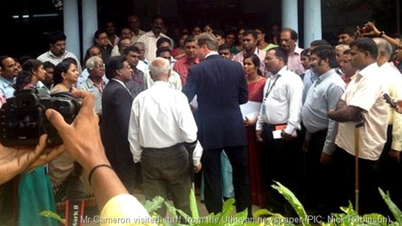 Mr Cameron visited staff from the Uthayan newspaper, whose printing presses were burnt to the ground in a recent attack (PIC: Nick Robinson)