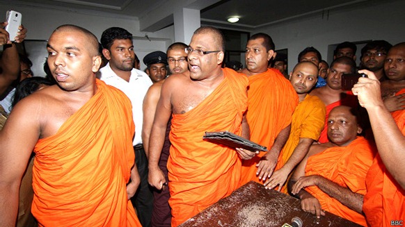 Wataraka Vijitha Thero (seated right) has seen press conferences disrupted 